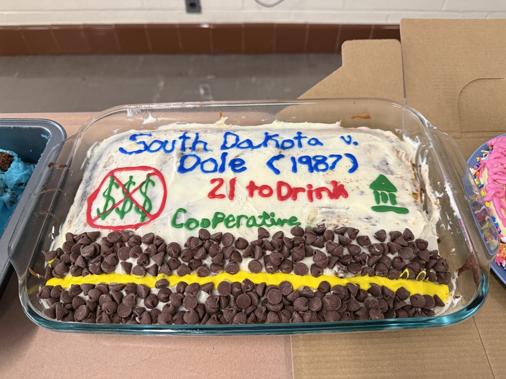 🎂 Twenty-two senior students in Mr. Brian Bushner’s AP Government and Politics class recently held their annual "Cake Day"!🍰 Students formed teams and chose a Supreme Court case to research that relates to the concept of federalism in the United States. Because federalism is sometimes described as either a “layered cake” or “marble cake”, students can bake a cake that displays the type of federalism their case would be classified as on the interior. For the exterior, they decorate the cake based on the theme of the case.  The Supreme Court cases and teams were as follows: Roe v. Wade (two teams/ cakes: Zoe and Brooke / Ayden) Obergefell v. Hodges (Ana, Chyah, Karalina, Ethan)  South Dakota v. Dole (Lizzy, Katy, Mattison)  Brown v. Board of Education (two teams/cakes: Kady, Ava, Sydne, Erin / Halley, Paylyn) Gibbons v. Ogden (Luke, Wyatt, Chris, Blake)  Students are given a lot of freedom with this project, as long as they can explain the concept of federalism as it relates to the SCOTUS case. Mr. Bushner shared that he was “Impressed with how creative the students were and how broadly they looked through U.S. history to choose their cases.” The students always enjoy this creative assignment and have fun tasting the cakes too! Thanks for sharing this project and pictures, Mr. Bushner!