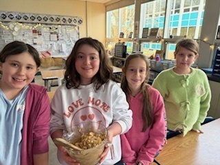 A few updates from our friends in fourth grade: Students in Mrs. Brownell & Mrs. Wells’ fourth-grade class used their recess time to tidy up and organize the Lost and Found this week. If you recognize any of these items, please have your child visit the Lost and Found! Mrs. Brownell and Mrs. Wells also made the official New York State Apple Muffins with their social studies students. This was a tasty way to experience teamwork and learn about New York State Symbols. Students in Ms. Donohue's class recently had a fun chemical change experiment. We love seeing the students getting creative in the classroom. Thanks for sharing, Mrs. Brownell, Mrs. Wells, and Ms. Donohue!!