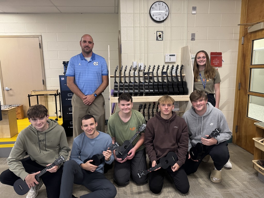 Mr. Bundrick's high school construction class recently had a fun and practical project. The students made a ukulele stand for Ms. Murphy's elementary school music room. The elementary students were so impressed that they made thank-you cards for Mr. Bundrick and his students, to show their appreciation. The stand came out great! 🔨It is so nice to see these students bringing ideas to life, and inspiring our younger students!🎸