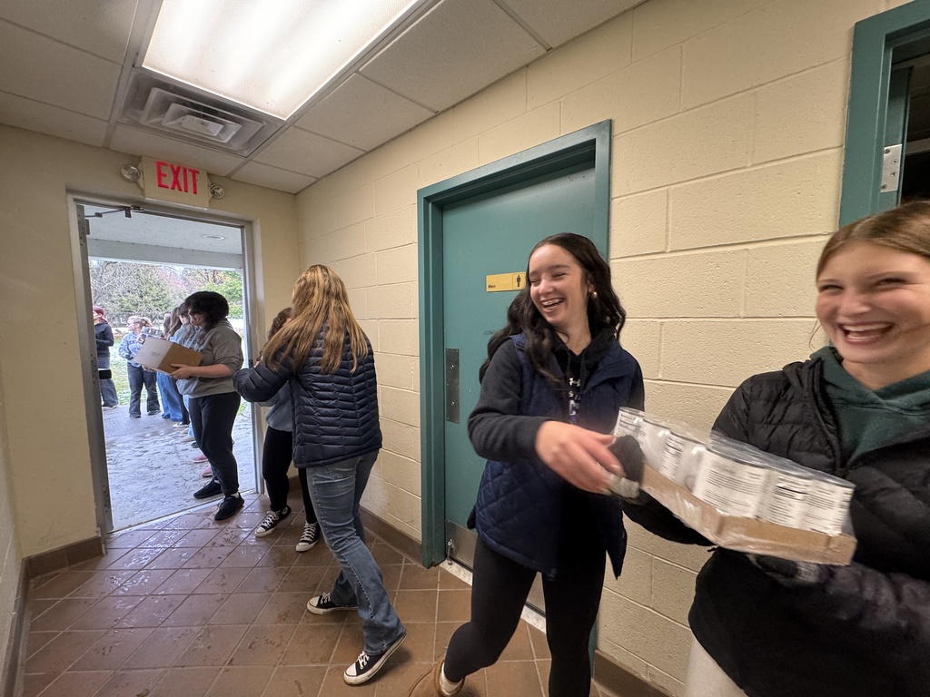 Last week, 24 National Junior Honor Society students and Mrs.  Mabey went to our local food pantry, Hoosick Area Church Association (HACA). The students moved ~5,000 lbs of food from HACA to the Town's Reynolds-Gilchrest Skating Rink, to be sorted and placed into ~180 Thanksgiving distribution boxes for the community. 💙🤍