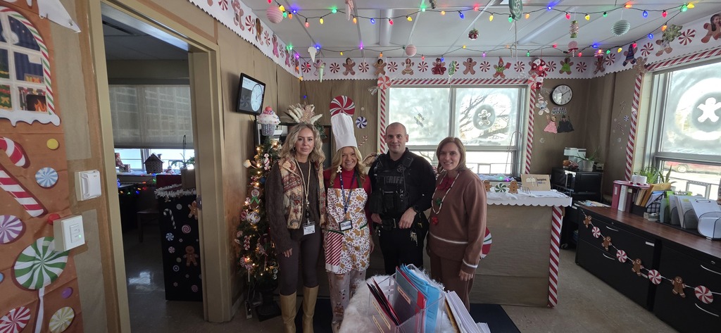 Our School Resource Officer, Deputy Garhartt, organized a fun activity this holiday season. Each school office participated in a friendly office decorating contest! Our pre-k students made the rounds today to judge the decorations, and the elementary's gingerbread theme was their favorite, followed by the middle school's Island of Misfit Toys theme, and the high school's Elf the movie theme. Our office staff went above and beyond to make our spaces special for our students! Everyone did a great job!!