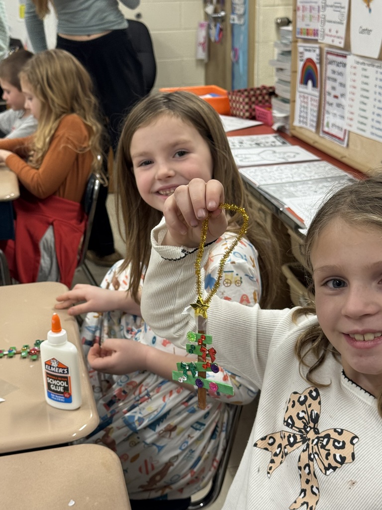 NJHS students make ornaments with second grade