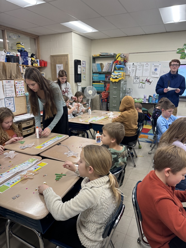 NJHS students make ornaments with second grade