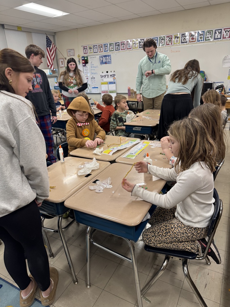 NJHS students make ornaments with second grade