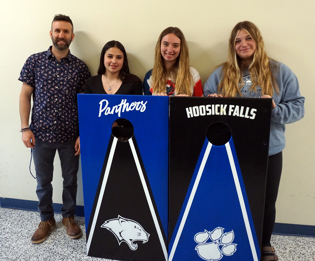 High School Art Teacher, Mr. Rob Viera, worked with a few of his art students to design and paint cornhole boards for an ADAPT fundraiser, set to take place in the fall. The boards were donated by a member of the ADAPT team, and then designed and painted by Natalie Pello (not pictured), Kaydence Williams, Daylin Acevedo, Faydra Nuccio, and Mr. Viera. Thanks for sharing Mr. Viera, and stay tuned for more information about this fundraiser, which will benefit the Class of 2027. 🐾 