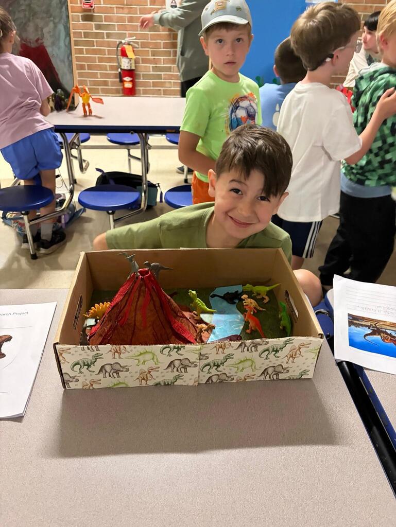 🦖Last week, second graders had their annual Dinosaur Museum Day! Students chose a dinosaur to research, made a report in school, and then continued the learning at home and created a presentation. Elementary students from the other grades had the chance to come through the "Museum" and hear from the students about their projects, and then friends and families got to join in the fun, too. Great job to the second-grade team, and thanks for sharing your photos! Dino Day is always a roaring success!🦕