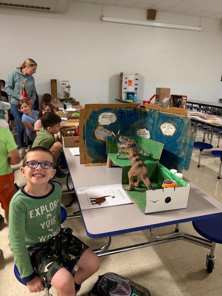 🦖Last week, second graders had their annual Dinosaur Museum Day! Students chose a dinosaur to research, made a report in school, and then continued the learning at home and created a presentation. Elementary students from the other grades had the chance to come through the "Museum" and hear from the students about their projects, and then friends and families got to join in the fun, too. Great job to the second-grade team, and thanks for sharing your photos! Dino Day is always a roaring success!🦕