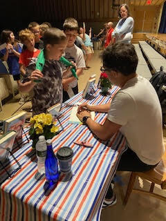 Our Middle School/High School Librarian, Mrs. Antolick, wanted to share highlights from a special day in our library! 📚 On June 12, Hoosick Falls had the honor of welcoming internationally acclaimed young adult author Pablo Cartaya. Throughout the day, he met with our fifth- and sixth-grade students, sharing how our experiences shape our journeys and how we can learn, grow, and find strength through them. Mr. Cartaya also led an engaging writers' workshop, giving students a behind-the-scenes look at his creative process and offering tips for crafting compelling stories. Students were thrilled to meet the author of a book they had been reading, ask thoughtful questions, and have their books signed. Thank you, Mrs. Antolick, for organizing this incredible opportunity and for sharing these wonderful moments with our school community!🐾
