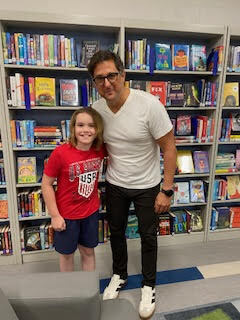 Our Middle School/High School Librarian, Mrs. Antolick, wanted to share highlights from a special day in our library! 📚 On June 12, Hoosick Falls had the honor of welcoming internationally acclaimed young adult author Pablo Cartaya. Throughout the day, he met with our fifth- and sixth-grade students, sharing how our experiences shape our journeys and how we can learn, grow, and find strength through them. Mr. Cartaya also led an engaging writers' workshop, giving students a behind-the-scenes look at his creative process and offering tips for crafting compelling stories. Students were thrilled to meet the author of a book they had been reading, ask thoughtful questions, and have their books signed. Thank you, Mrs. Antolick, for organizing this incredible opportunity and for sharing these wonderful moments with our school community!🐾