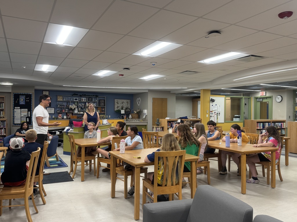Our Middle School/High School Librarian, Mrs. Antolick, wanted to share highlights from a special day in our library! 📚  On June 12, Hoosick Falls had the honor of welcoming internationally acclaimed young adult author Pablo Cartaya. Throughout the day, he met with our fifth- and sixth-grade students, sharing how our experiences shape our journeys and how we can learn, grow, and find strength through them.  Mr. Cartaya also led an engaging writers' workshop, giving students a behind-the-scenes look at his creative process and offering tips for crafting compelling stories. Students were thrilled to meet the author of a book they had been reading, ask thoughtful questions, and have their books signed.  Thank you, Mrs. Antolick, for organizing this incredible opportunity and for sharing these wonderful moments with our school community!🐾