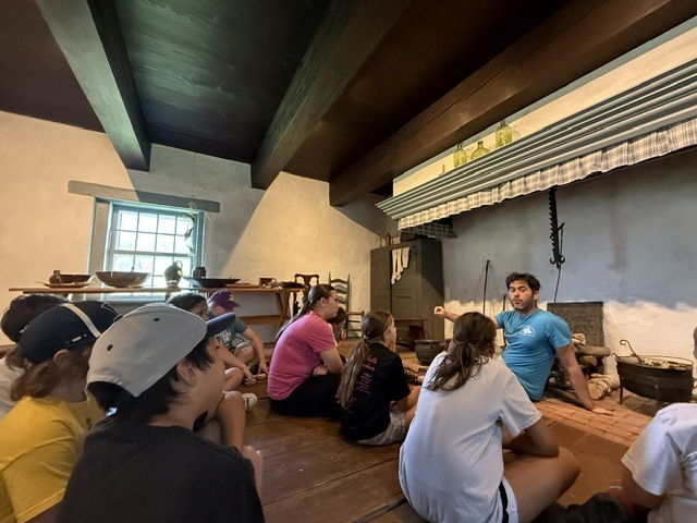 Last Wednesday, Living History Summer Institute students visited Mabee Farm. Mabee Farm was a big hit! The animals, butter churning, grain threshing, and digging potatoes gave them lots of hands-on opportunities to learn about life on a farm in the 18th Century. The kids all did an awesome job! Everyone is ready to be an 18th-century farmer. Thanks for sharing, Mrs. Brownell!