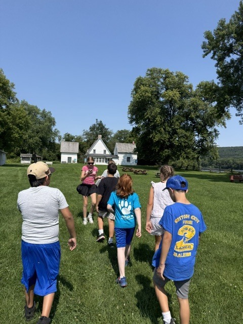 Last Wednesday, Living History Summer Institute students visited Mabee Farm. Mabee Farm was a big hit! The animals, butter churning, grain threshing, and digging potatoes gave them lots of hands-on opportunities to learn about life on a farm in the 18th Century. The kids all did an awesome job! Everyone is ready to be an 18th-century farmer. Thanks for sharing, Mrs. Brownell!