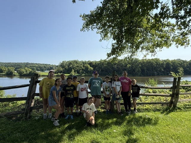 Last Wednesday, Living History Summer Institute students visited Mabee Farm. Mabee Farm was a big hit! The animals, butter churning, grain threshing, and digging potatoes gave them lots of hands-on opportunities to learn about life on a farm in the 18th Century. The kids all did an awesome job! Everyone is ready to be an 18th-century farmer. Thanks for sharing, Mrs. Brownell!
