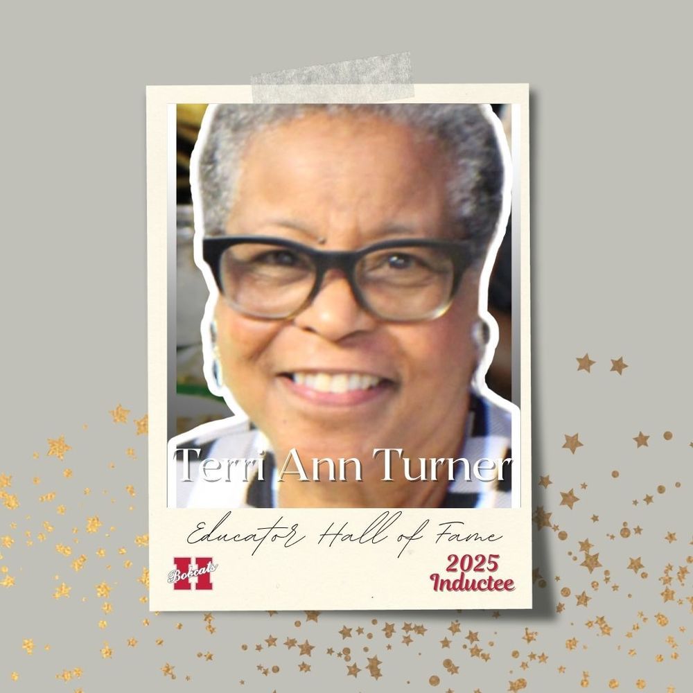 Close-up portrait of Terri Ann Turner smiling warmly, wearing dark-framed glasses. The image is framed with a cream-colored border that reads ‘Terri Ann Turner — Educator Hall of Fame 2025 Inductee.’ Gold star accents decorate the background.”