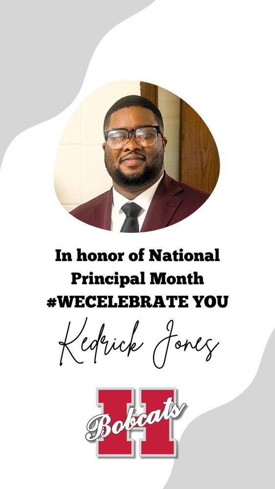 “Portrait of Kedrick Jones smiling and wearing glasses, a white shirt, black tie, and maroon suit jacket. The background is light-colored. Text on the image reads: ‘In honor of National Principals Month #WECELEBRATE YOU Kedrick Jones.’ Below is the red and white Hope Bobcats ‘H’ logo.”