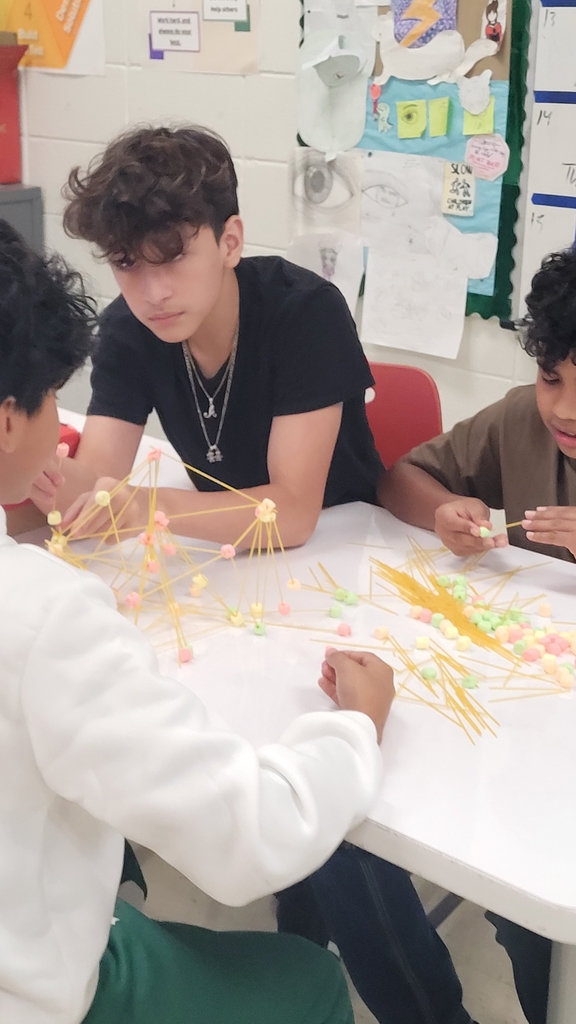 group of student having a discussion about how best to proceed
