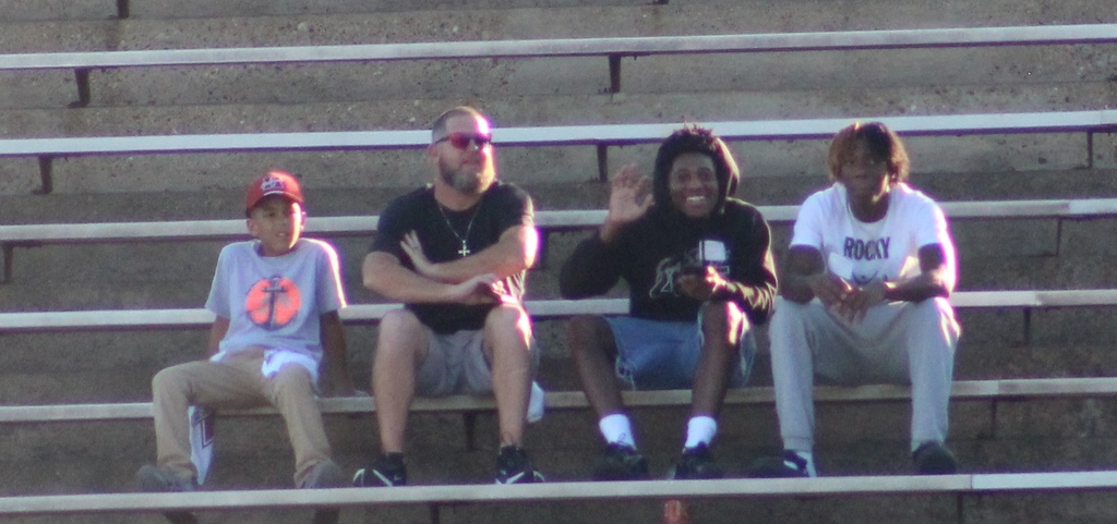 Coach Clark and Bobcats Noah Cheatham and Devante Jones