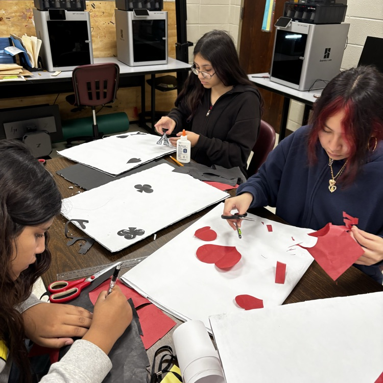 Students are busy making things work.