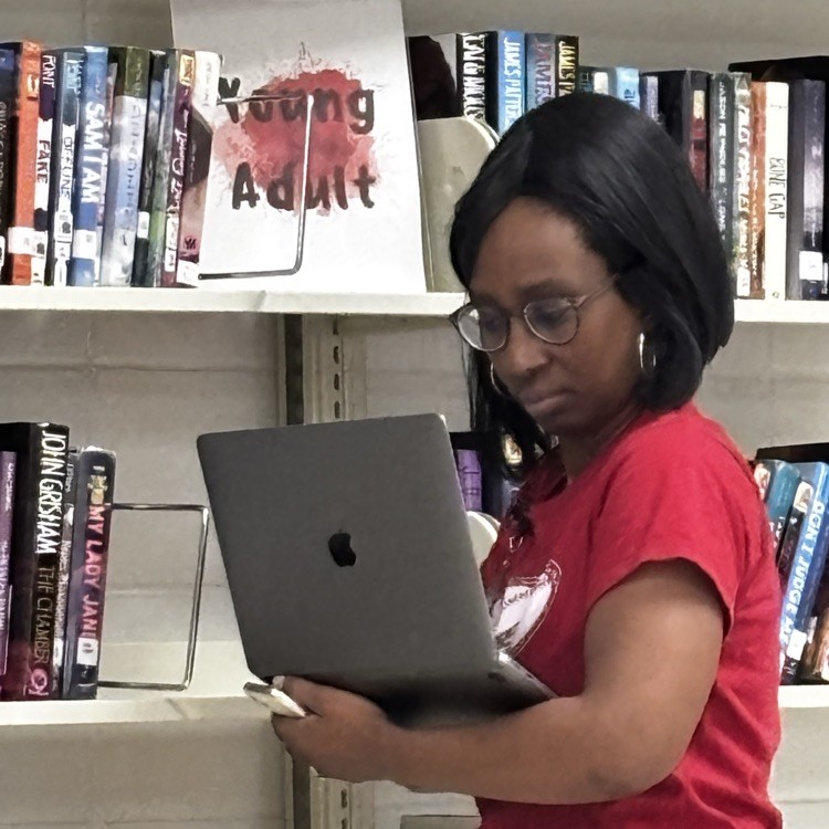 Mrs. Wyatt is doing a little book research.