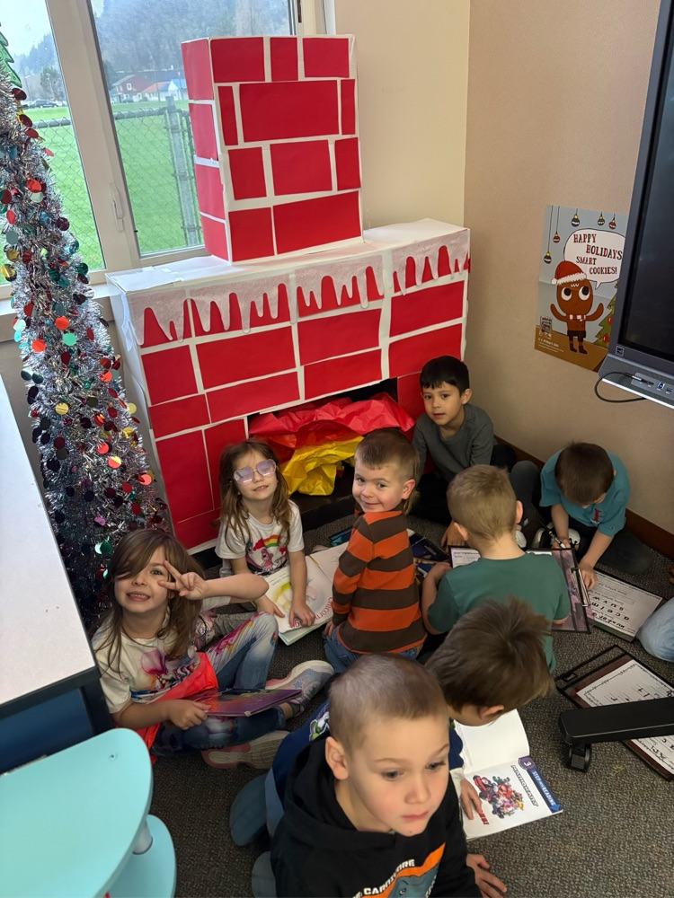 students reading by the “fireplace"