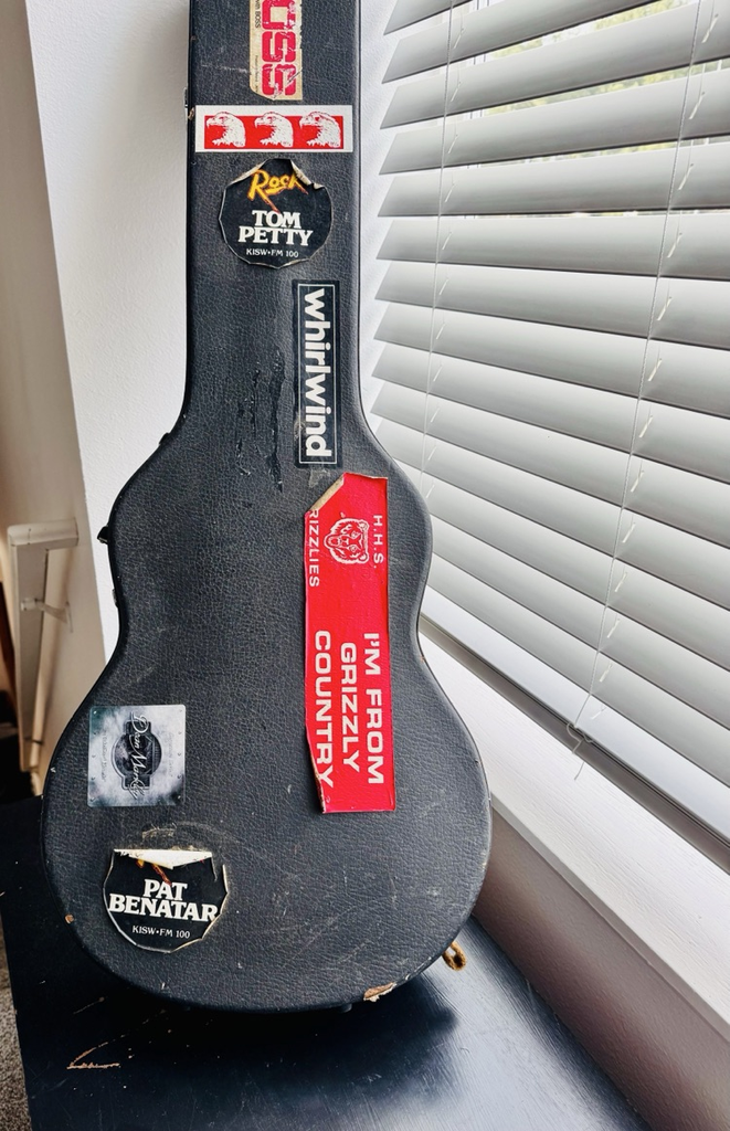 guitar case with HHS sticker