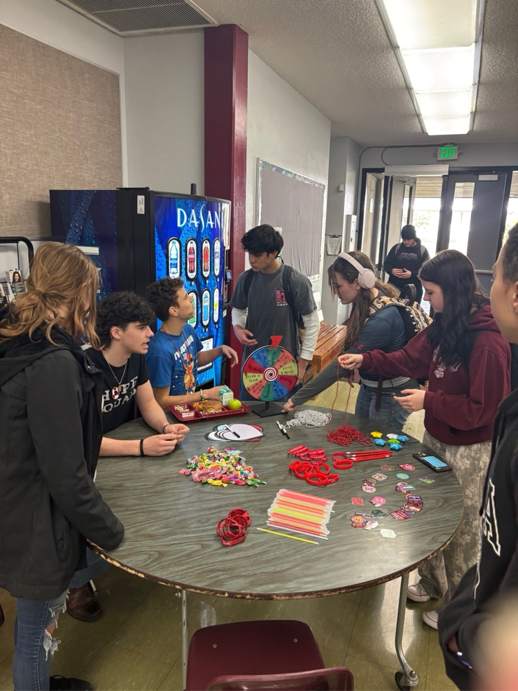 students spinning the prize wheel