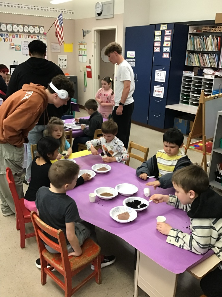 students working together on earth day