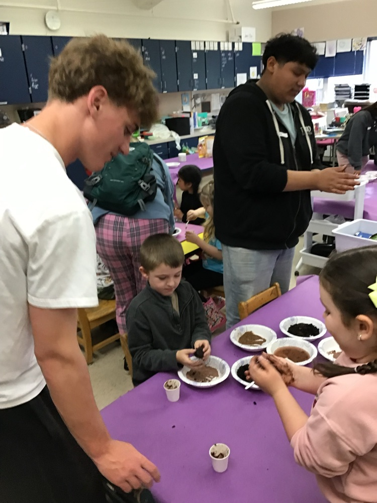 students working together on earth day