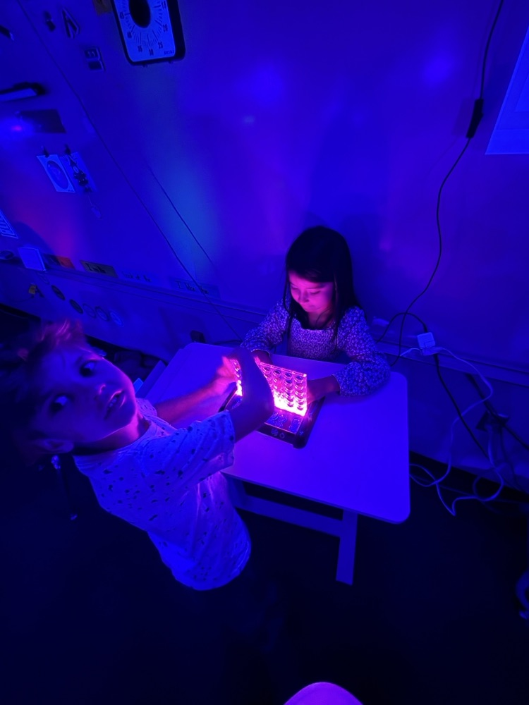 students at glow party