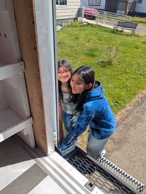 Students visiting book mobile