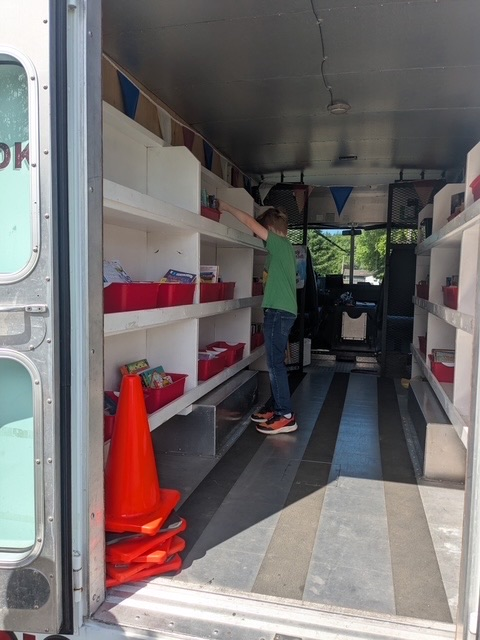 Students visiting book mobile