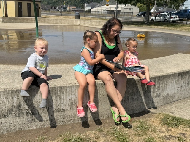 reading with friends at the book mobile