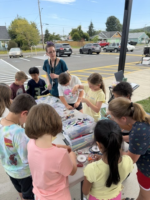 kids doing crafts at the book mobile