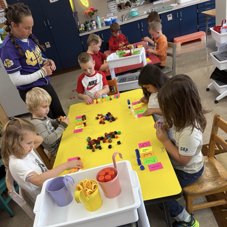 students working with counting cubes