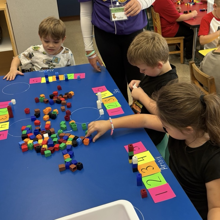 students working with counting cubes