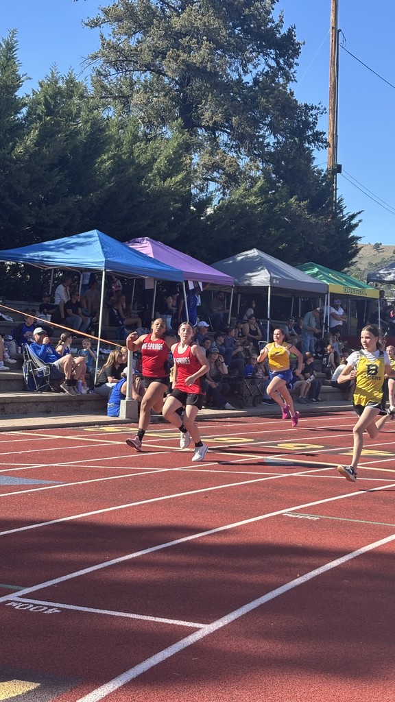 Student competing in a track and field event. 