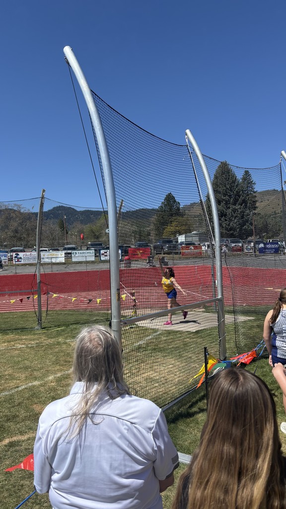 Student competing in a track and field event. 