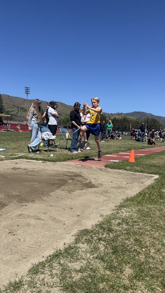 Student competing in a track and field event. 