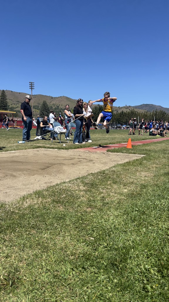Student competing in a track and field event. 