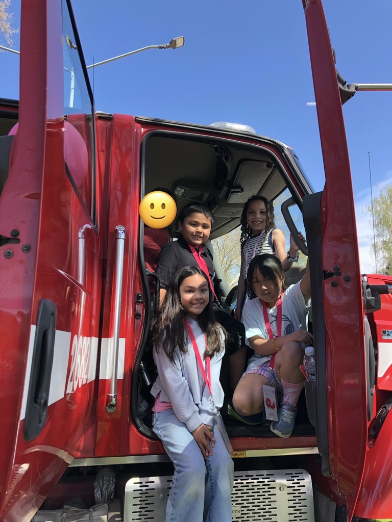 Students in a red truck.