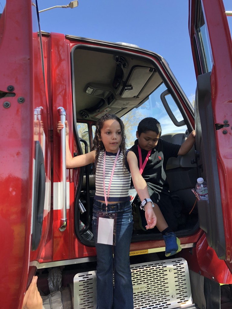 Students in a red truck.