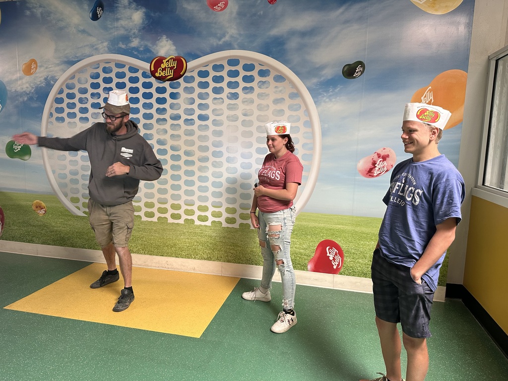 Students and chaperone playing a game at the Jelly Belly Factory.