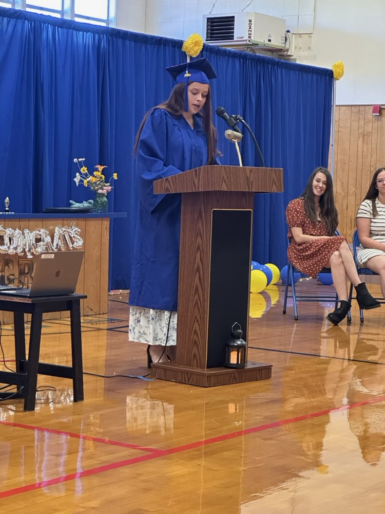 student at the podium making a speech 