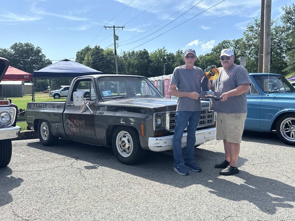 John Smith and Mr Beshear accepting the Award for the Best Shop Truck.