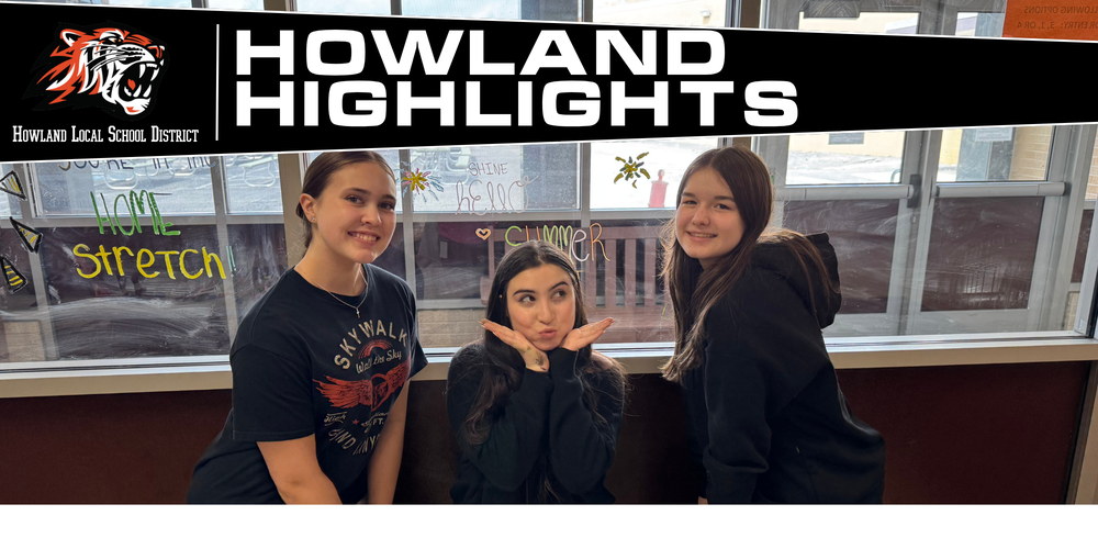 Students from the Health, Safety, and Wellness Club decorate school windows with colorful artwork and positive messages before summer break.