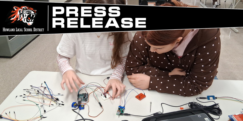 Howland Intermediate School students participate in Ohio Code Scholar, with Kenley and Ryeliegh working on Arduino wiring and audio while classmates develop ideas for 3D designs.
