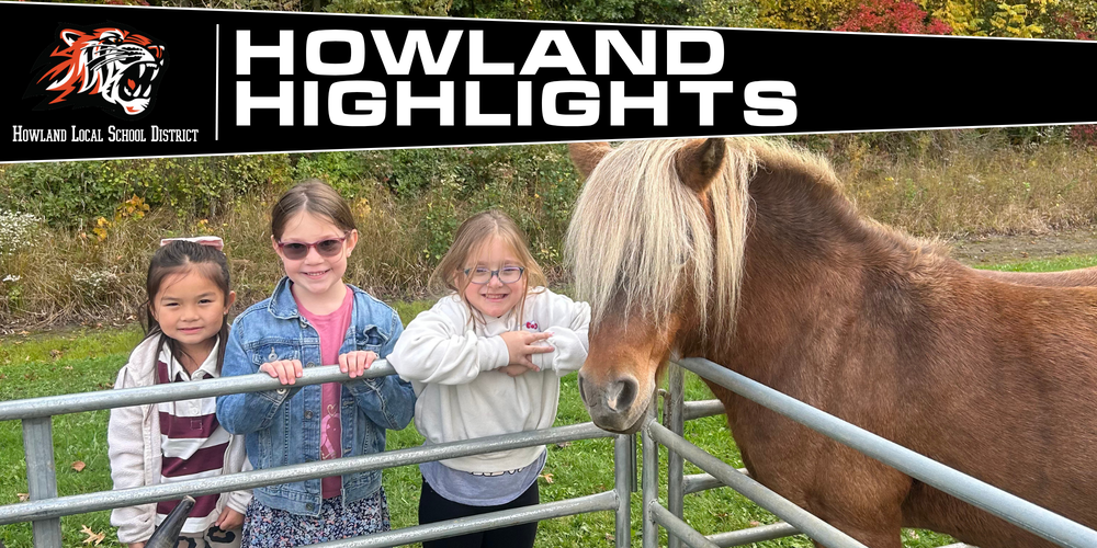 Students at Howland Springs Primary School participate in Zoo on the Go, an onsite field trip offered as part of the school's random attendance incentive days.
