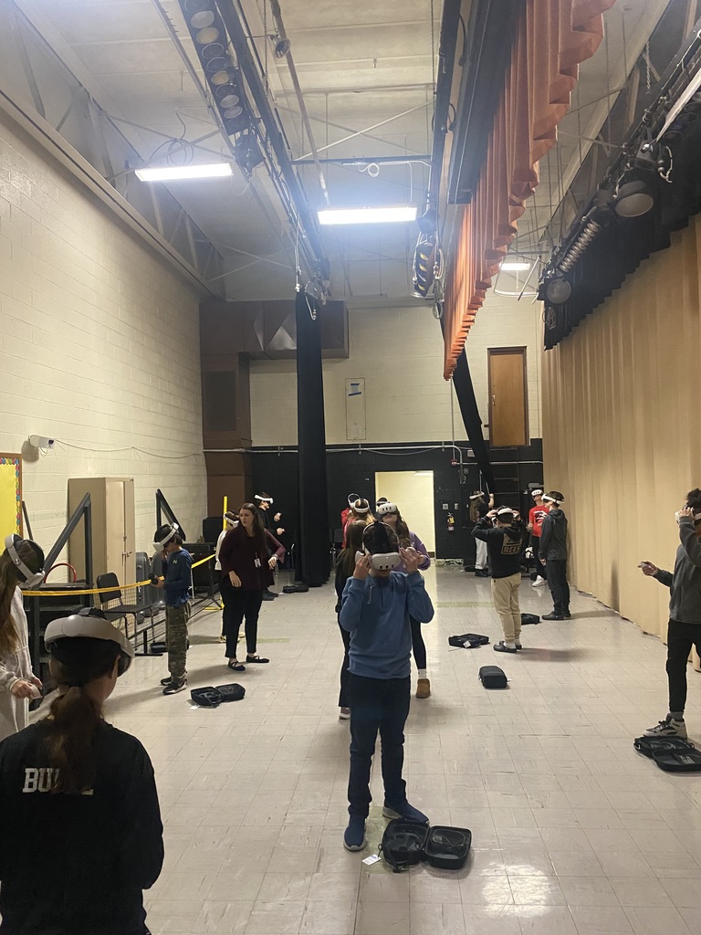 7th graders wearing VR headsets in class during a career exploration activity.