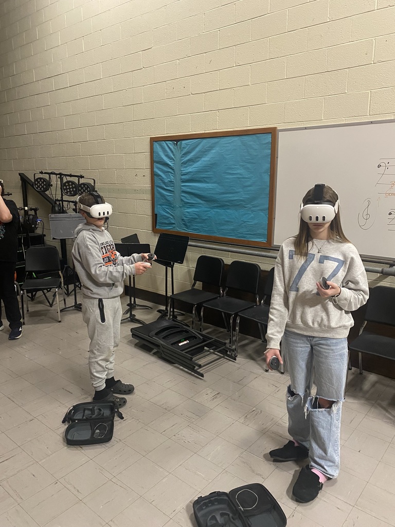 7th graders wearing VR headsets in class during a career exploration activity.