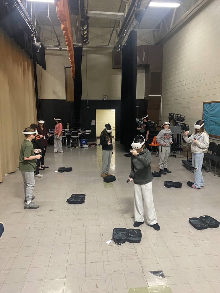 7th graders wearing VR headsets in class during a career exploration activity.